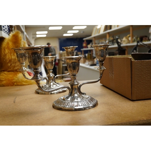 A pair of Elizabeth II silver mounted two branch, three light dwarf ...