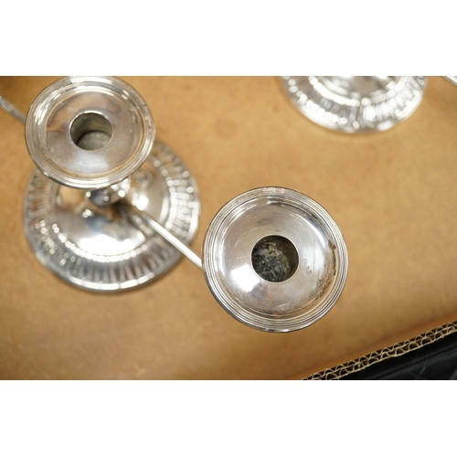 A pair of Elizabeth II silver mounted two branch, three light dwarf ...
