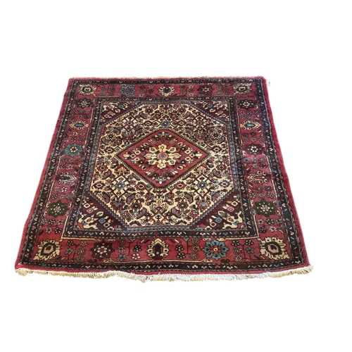 1068 - A North West Persian rug, 107 x 103cm