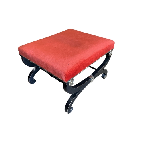 1070 - A Regency style gilt metal mounted upholstered ebonised stool, width 64cm, depth 55cm, height 41cm... 