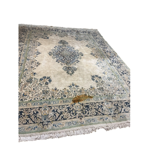 1072 - An Indian ivory ground carpet, 360 x 270cm (stained in several places)
