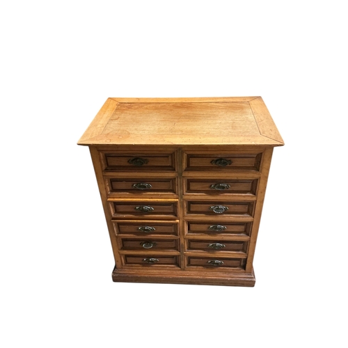 1073 - A late Victorian walnut miniature chest, width 61cm, depth 38cm, height 69cm