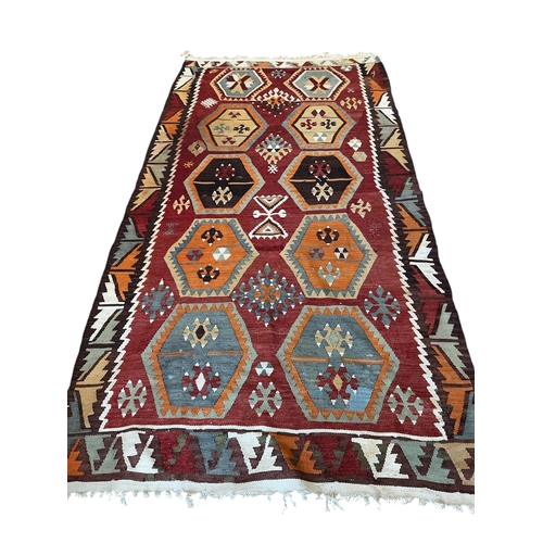 1074 - A Kilim polychrome flatweave rug, 240 x 120cm