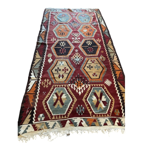 1074 - A Kilim polychrome flatweave rug, 240 x 120cm