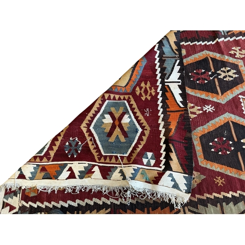 1074 - A Kilim polychrome flatweave rug, 240 x 120cm