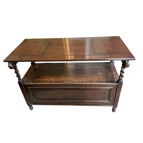 1075 - An early 20th century carved oak monk's bench, width 114cm, depth 54cm, height 93cm