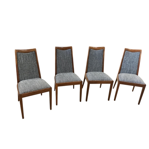 1076 - A set of eight mid century G Plan Fresco teak dining chairs, with drop-in seats, two with arms, with... 