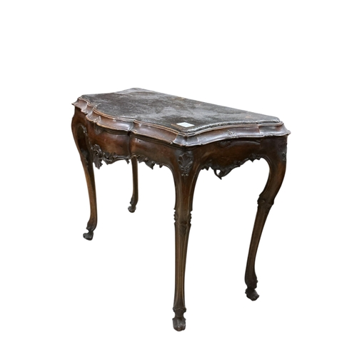 1077 - An 18th century style Italian serpentine leather topped walnut console table (adapted), width 84cm, ... 
