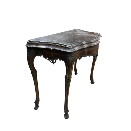 1077 - An 18th century style Italian serpentine leather topped walnut console table (adapted), width 84cm, ... 