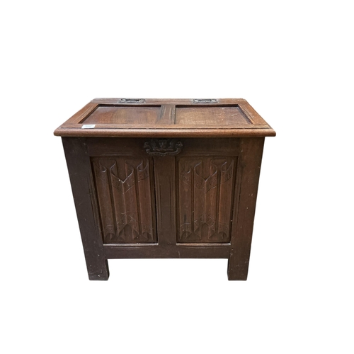 1079 - A small 17th century style linen fold carved oak coffer, width 76cm, depth 51cm, height 72cm