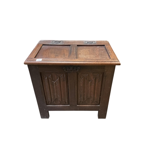 1079 - A small 17th century style linen fold carved oak coffer, width 76cm, depth 51cm, height 72cm