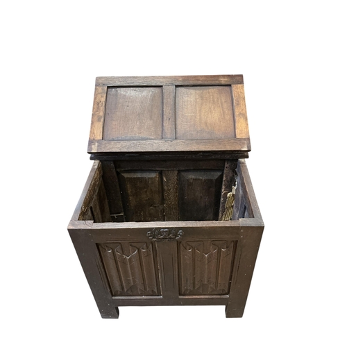 1079 - A small 17th century style linen fold carved oak coffer, width 76cm, depth 51cm, height 72cm