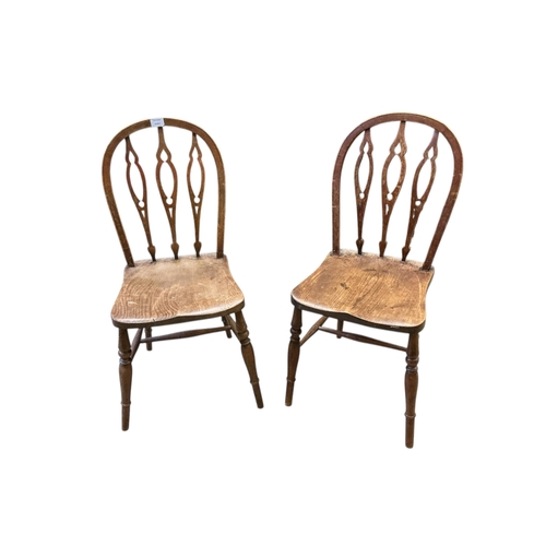 1081 - A pair of early 20th century Prior type elm and beech Windsor chairs, width 39cm, height 90cm
