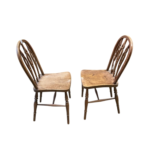 1081 - A pair of early 20th century Prior type elm and beech Windsor chairs, width 39cm, height 90cm