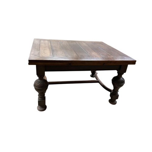 1083 - A Jacobean Revival rectangular oak draw leaf dining table, width 128cm, depth 107cm, height 73cm... 