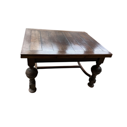 1083 - A Jacobean Revival rectangular oak draw leaf dining table, width 128cm, depth 107cm, height 73cm... 