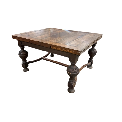 1083 - A Jacobean Revival rectangular oak draw leaf dining table, width 128cm, depth 107cm, height 73cm... 