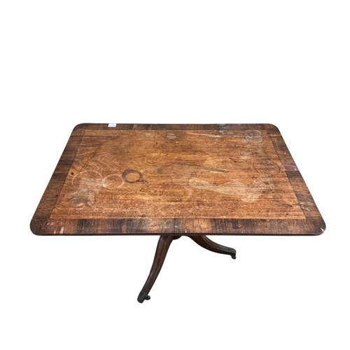 1086 - A Regency rectangular rosewood banded mahogany tilt top breakfast table, width 75cm, depth 111cm, he... 
