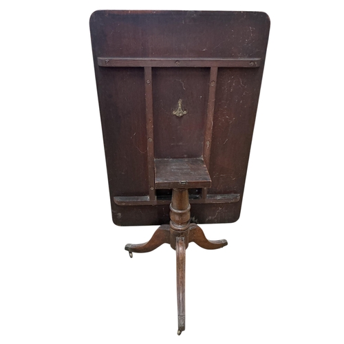 1086 - A Regency rectangular rosewood banded mahogany tilt top breakfast table, width 75cm, depth 111cm, he... 