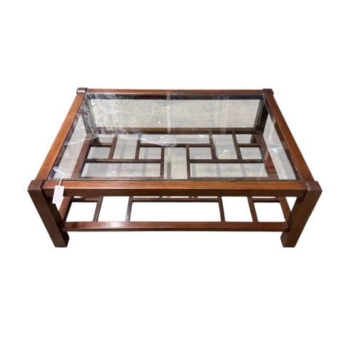 1088 - A Contemporary rectangular mahogany glass top coffee table, width 114cm, depth 84cm, height 40cm... 