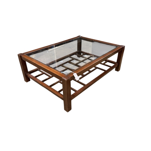 1088 - A Contemporary rectangular mahogany glass top coffee table, width 114cm, depth 84cm, height 40cm... 
