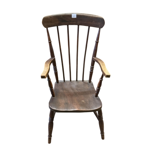 1099 - A Victorian elm and beech Windsor comb back armchair, width 49cm, depth 46cm, height 103cm