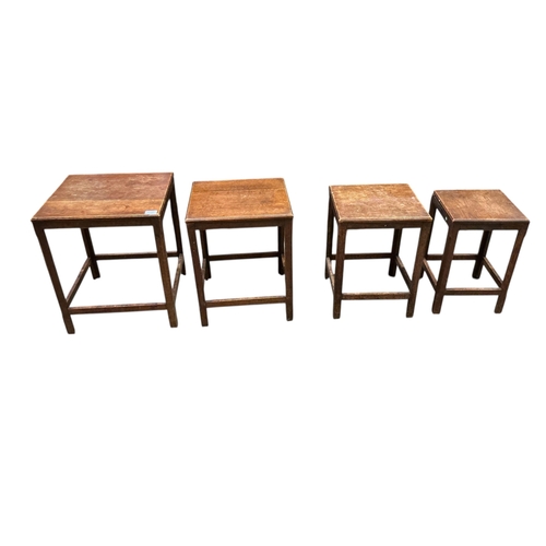 1101 - A quartetto of Arts & Crafts style oak tea tables, width 44cm, depth 45cm, height 54cm