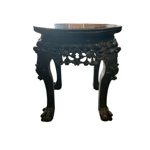 1105 - A Chinese circular padouk marble top vase stand, diameter 41cm, height 46cm