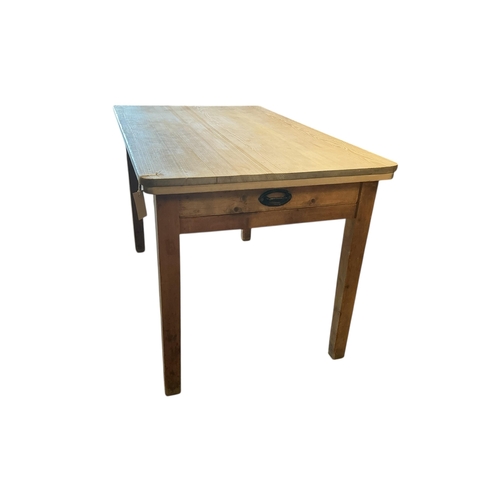1106 - A Victorian rectangular scrubbed pine kitchen table, width 123cm, depth 75cm, height 76cm