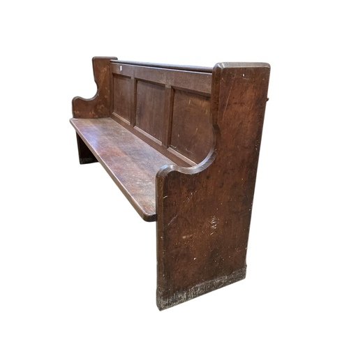 1108 - A Victorian panelled oak pew, width 196cm, depth 50cm, height 97cm