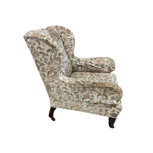 1113 - A late Victorian upholstered wing armchair, width 75cm, depth 78cm, height 91cm