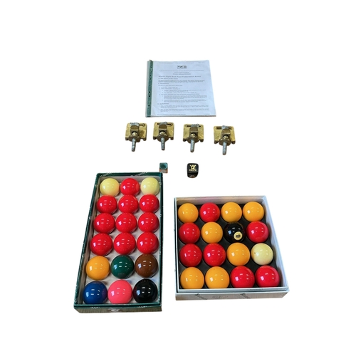 1128 - An oak snooker / dining table with rise and fall action, cues balls and accessories, width 218cm, de... 