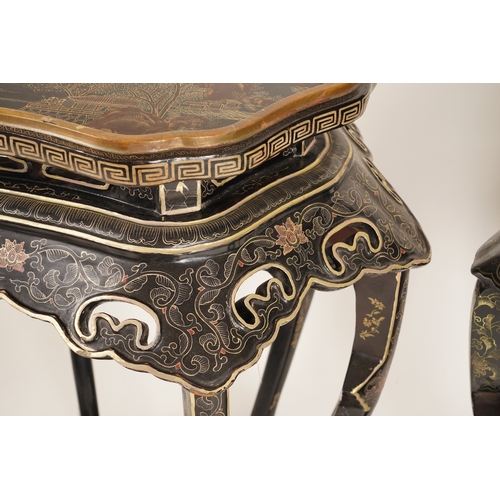 1131 - Two similar Chinese gilt-decorated black lacquer jardiniere stands, 20th century, each shaped top de... 