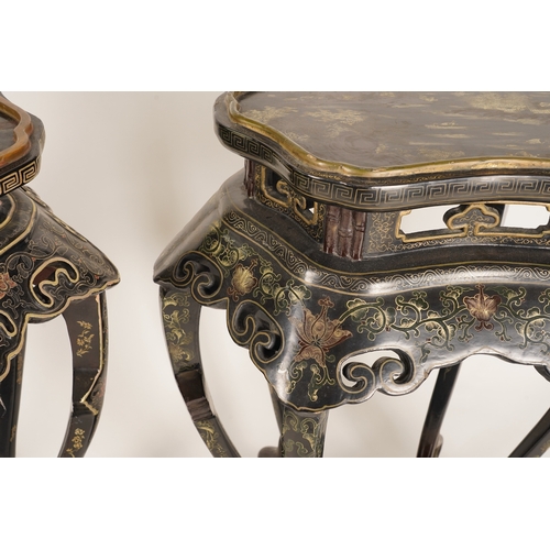 1131 - Two similar Chinese gilt-decorated black lacquer jardiniere stands, 20th century, each shaped top de... 