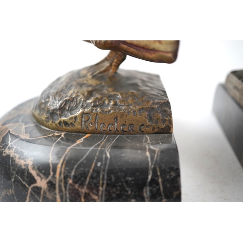 1251 - A pair of bronze peacock bookends, with remains of coloured pigments, marble plinths, signed R. Lecl... 