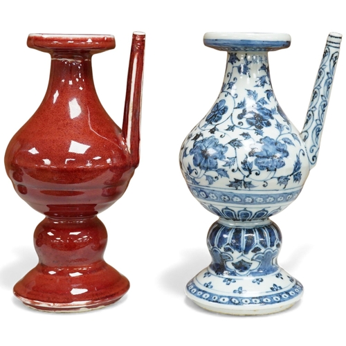1252 - A Chinese sang de boef ewer, and another in underglaze blue, 22cm high
