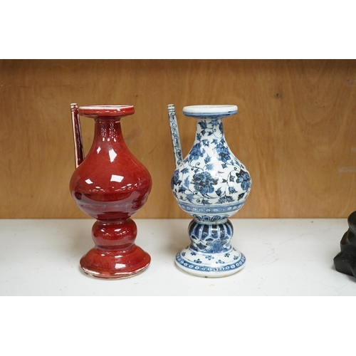 1252 - A Chinese sang de boef ewer, and another in underglaze blue, 22cm high