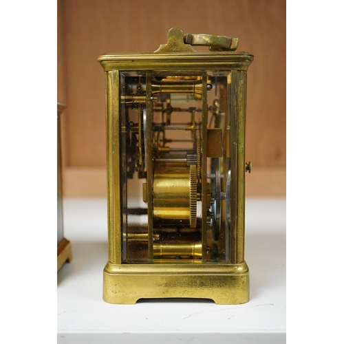 1264 - An early 20th century lacquered brass repeating carriage clock and a smaller carriage timepiece, hei... 