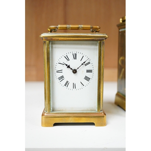 1264 - An early 20th century lacquered brass repeating carriage clock and a smaller carriage timepiece, hei... 