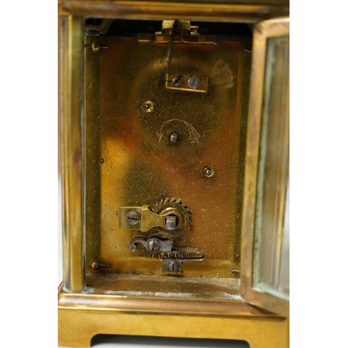 1264 - An early 20th century lacquered brass repeating carriage clock and a smaller carriage timepiece, hei... 