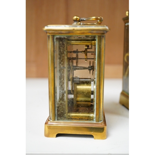 1264 - An early 20th century lacquered brass repeating carriage clock and a smaller carriage timepiece, hei... 