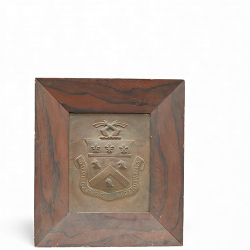 1275 - An heraldic copper panel in grained rosewood frame, panel 22cm x 16.5cm, overall 44.5 x 39.5cm... 