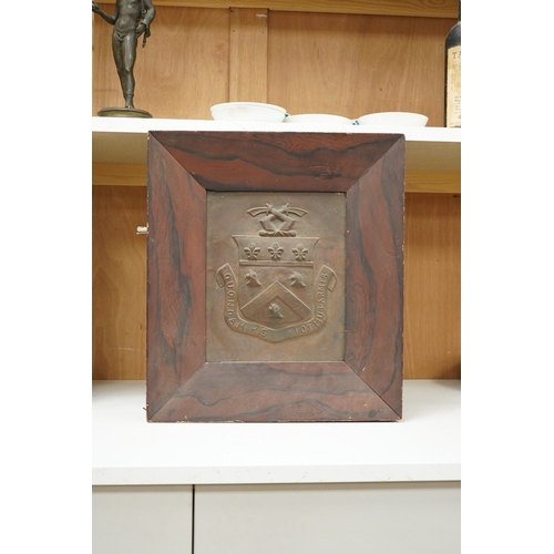 1275 - An heraldic copper panel in grained rosewood frame, panel 22cm x 16.5cm, overall 44.5 x 39.5cm... 