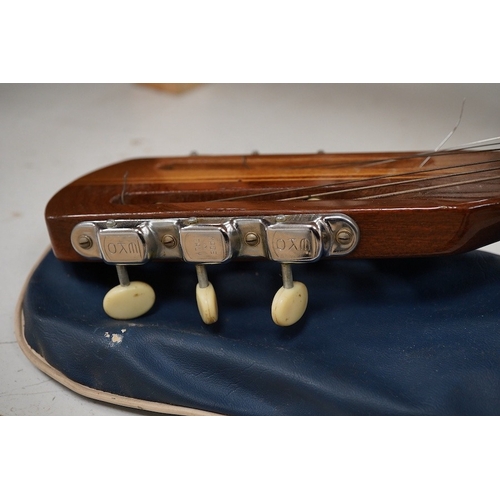 1279 - A Eko P 12 acoustic guitar with carry case