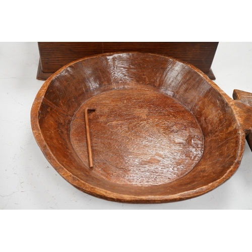 1292 - A late Victorian oak till, a mazer bowl - 57cm long, and a Huntley and Palmers novelty biscuit tin... 