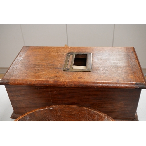 1292 - A late Victorian oak till, a mazer bowl - 57cm long, and a Huntley and Palmers novelty biscuit tin... 