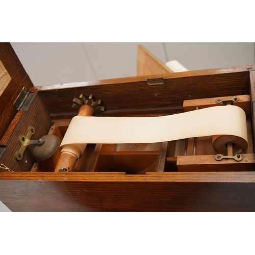 1292 - A late Victorian oak till, a mazer bowl - 57cm long, and a Huntley and Palmers novelty biscuit tin... 