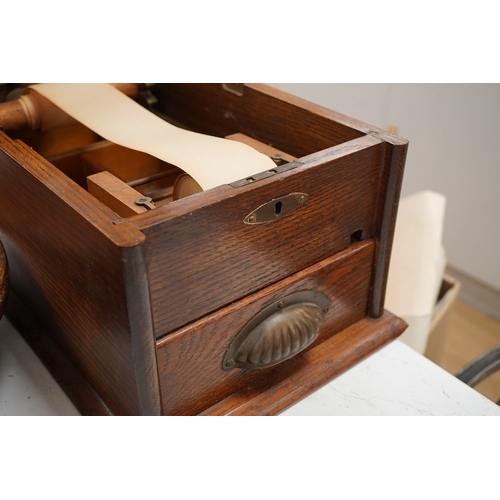 1292 - A late Victorian oak till, a mazer bowl - 57cm long, and a Huntley and Palmers novelty biscuit tin... 