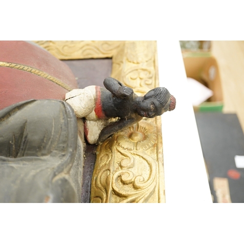 1295 - A giltwood panel with a carved elephant relief, 54cm x 53cm