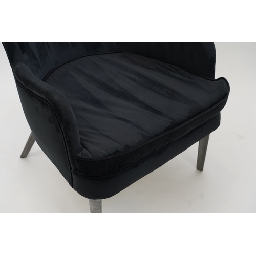 129 - Ernest Race (1913-1964) for Race Furniture: A 'DA1' armchair, designed in 1946, upholstered overall ... 